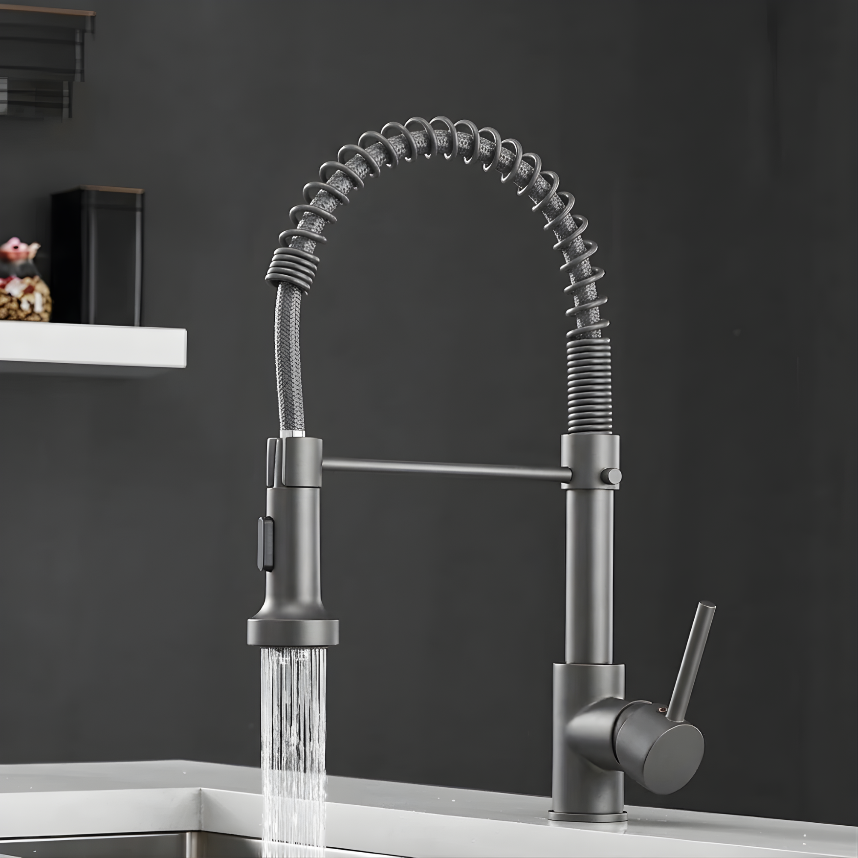 Modern kitchen faucet with pull-down spray head on a dark background