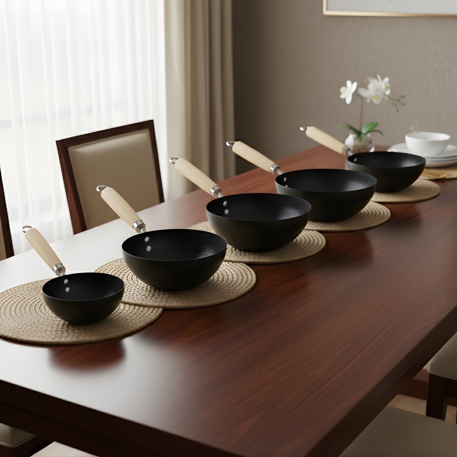 Set of black bowls with wooden handles on a wooden table