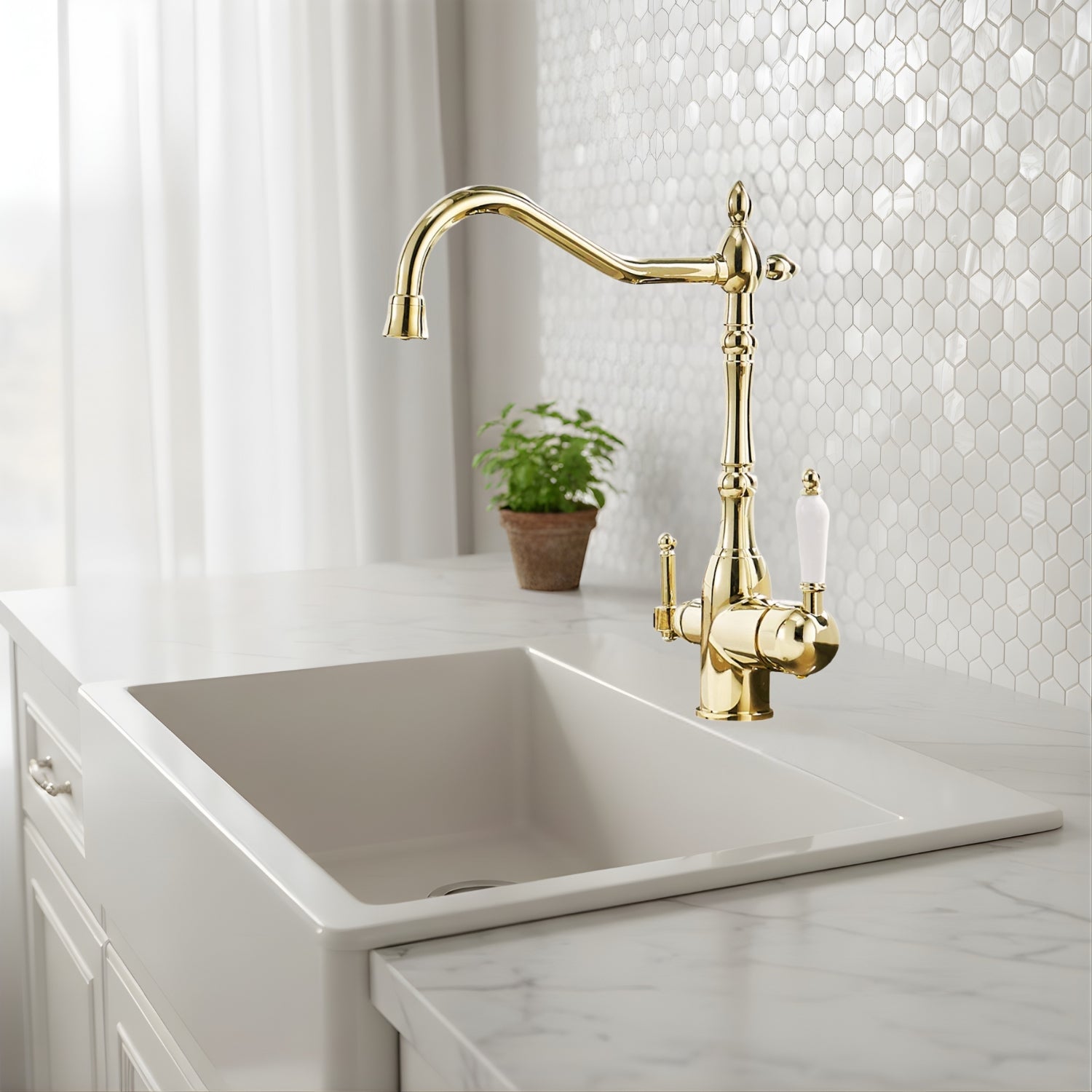 Gold kitchen faucet over a sink with a tiled wall background