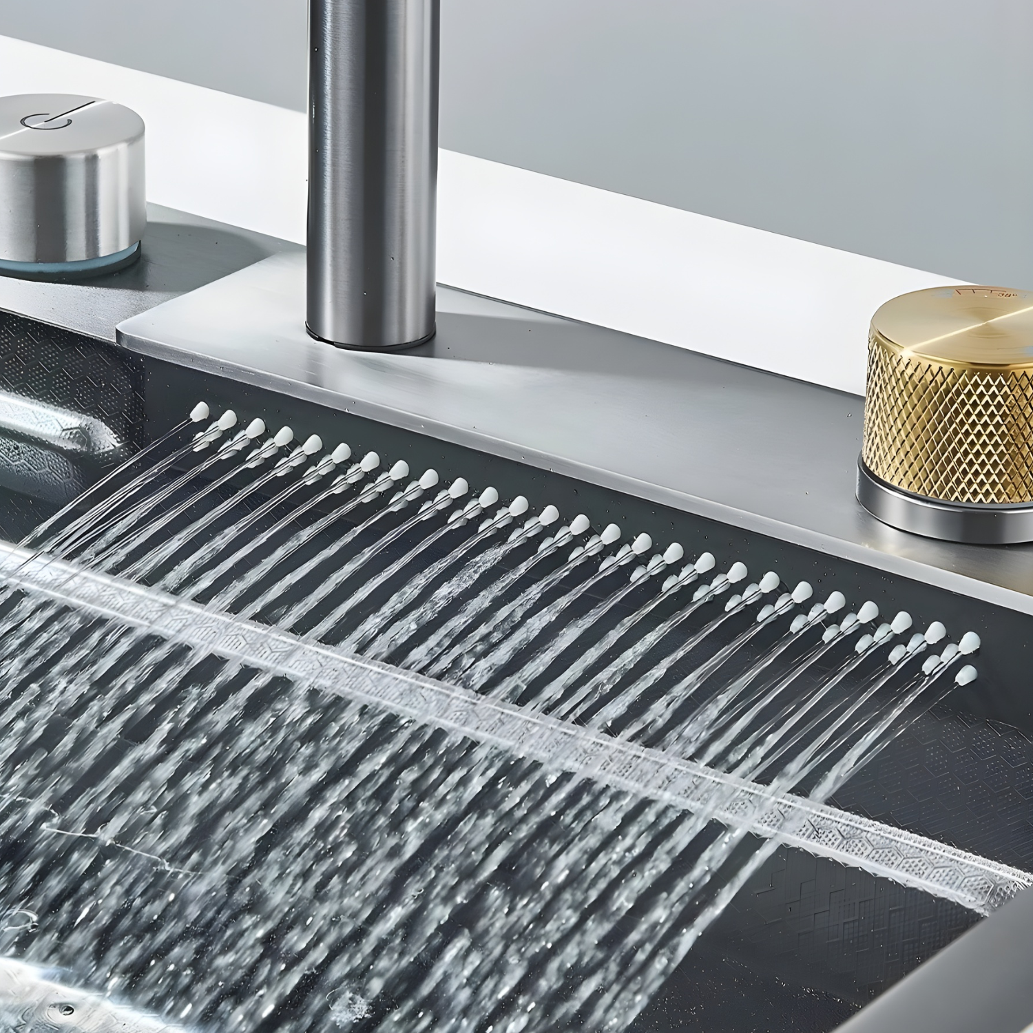 Close-up of a modern kitchen faucet with water flowing into a sink.