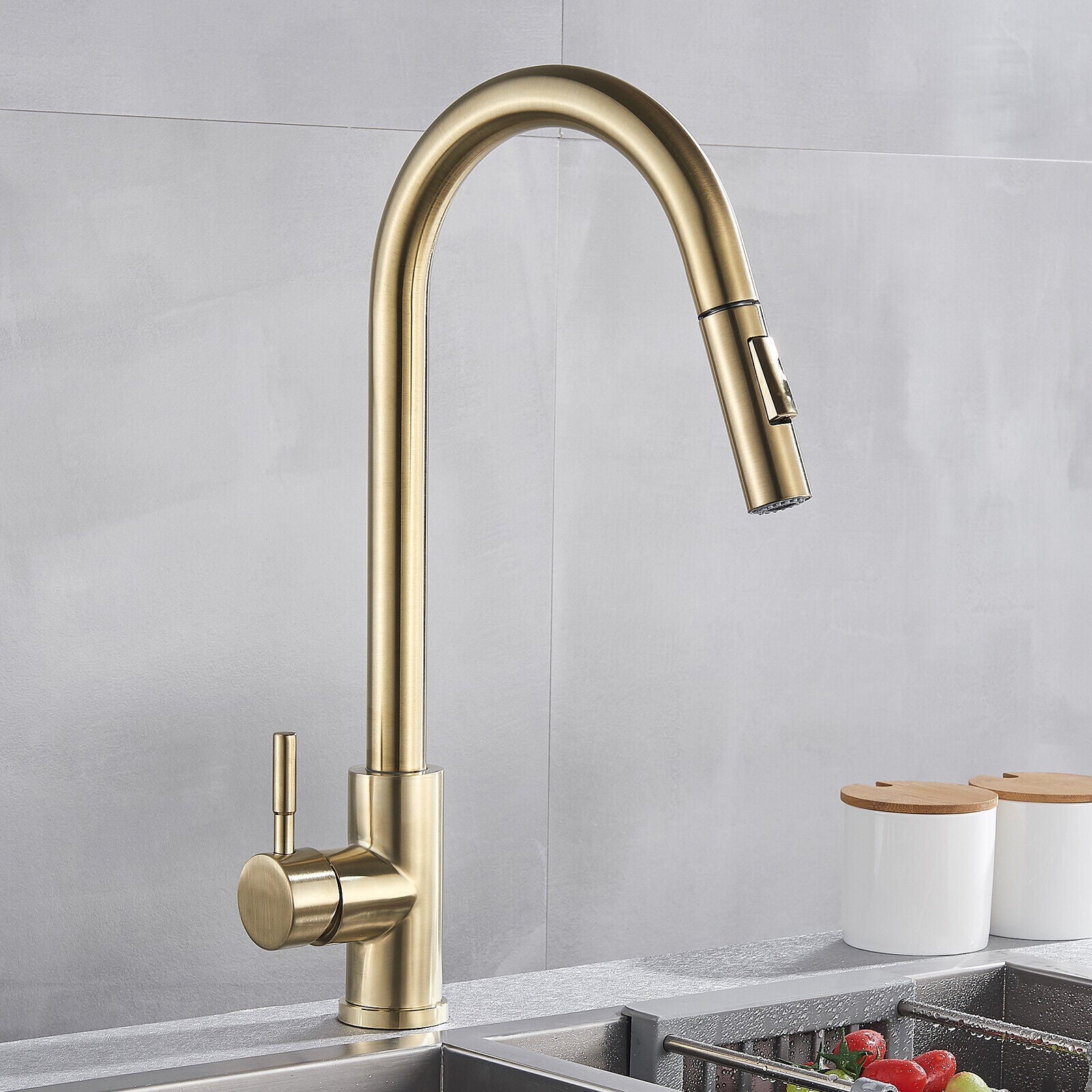 Golden minimalistic kitchen faucet