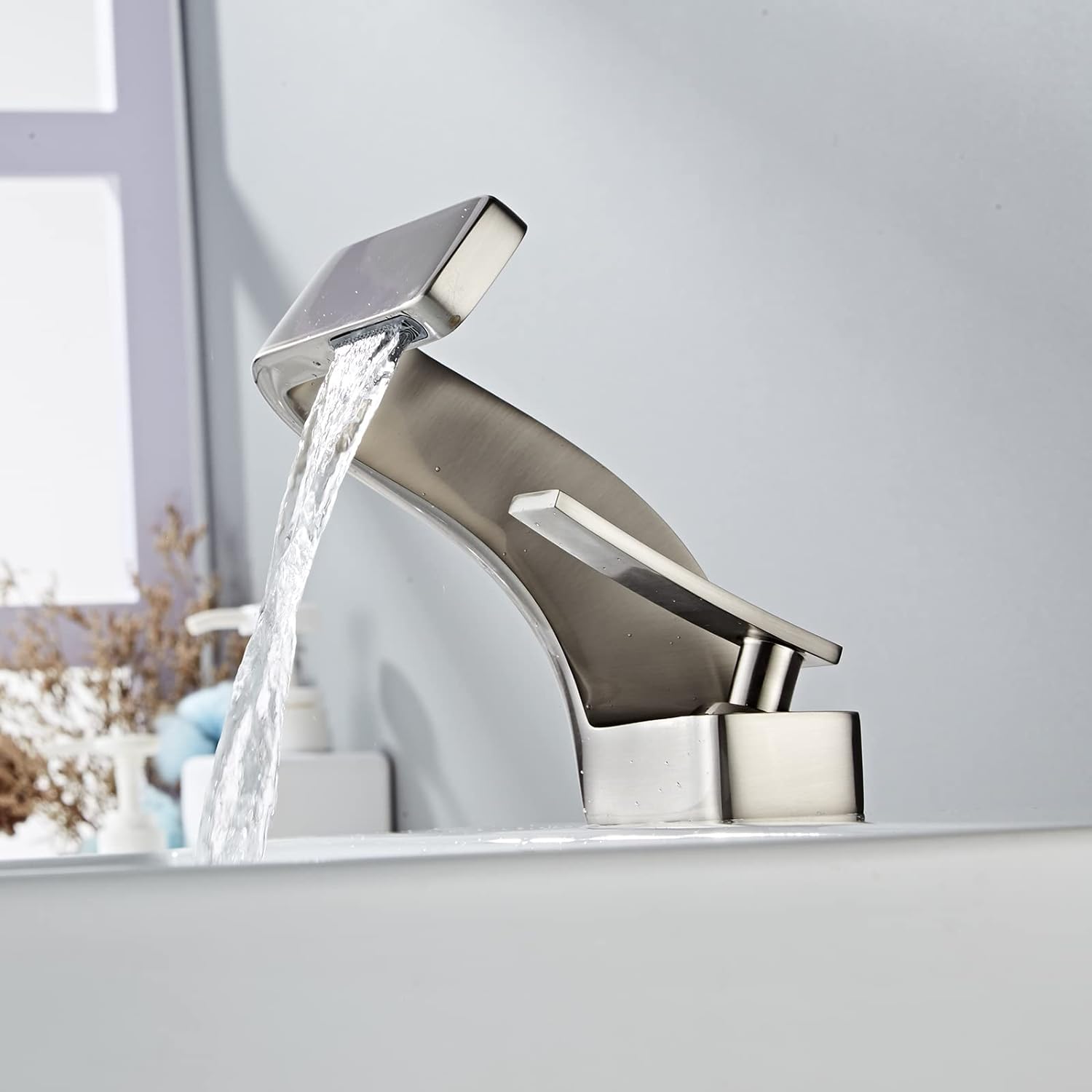 Brushed nickel modern bathroom faucet with minimalistic style