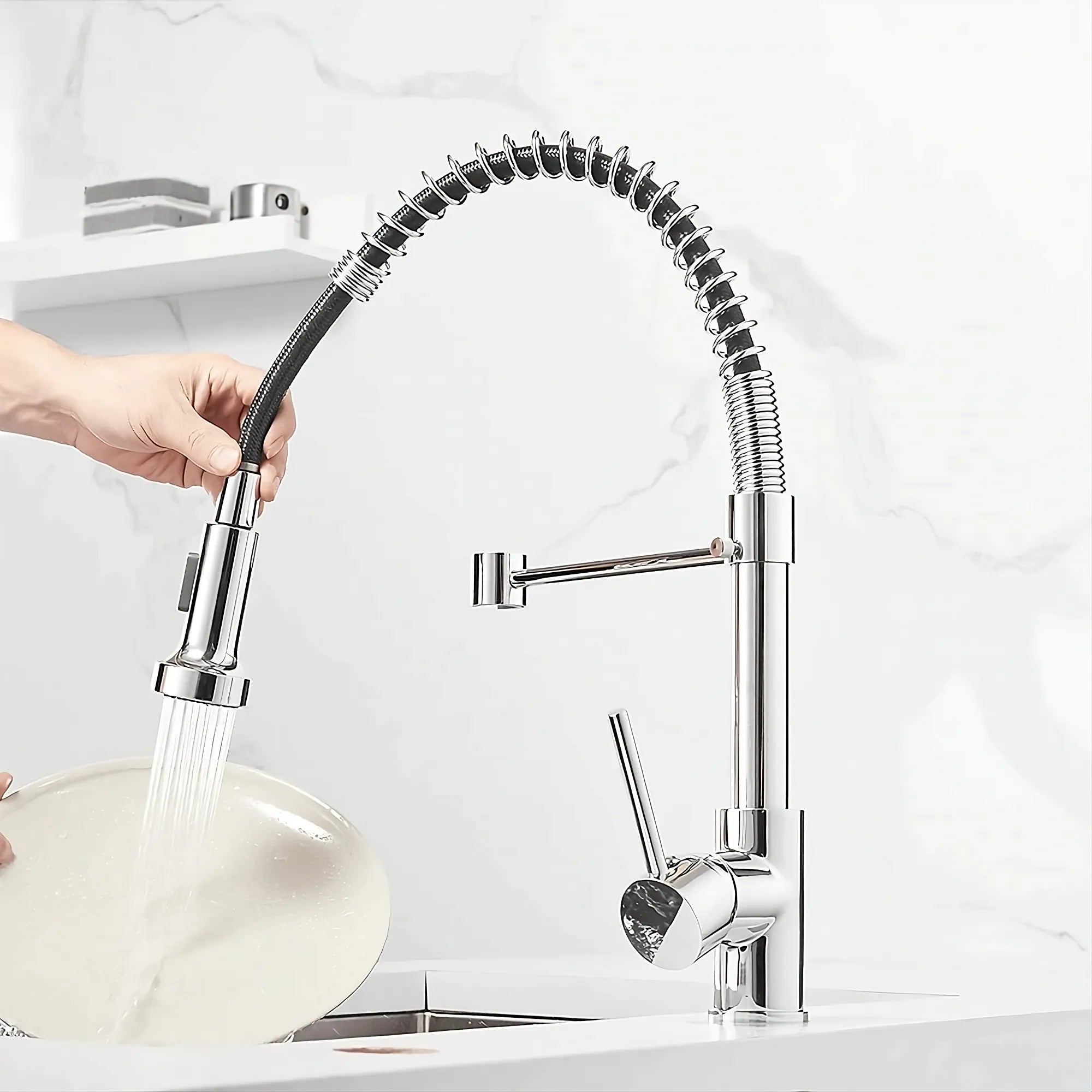 Using Chrome Halmstad pull-out kitchen faucet for washing dishes