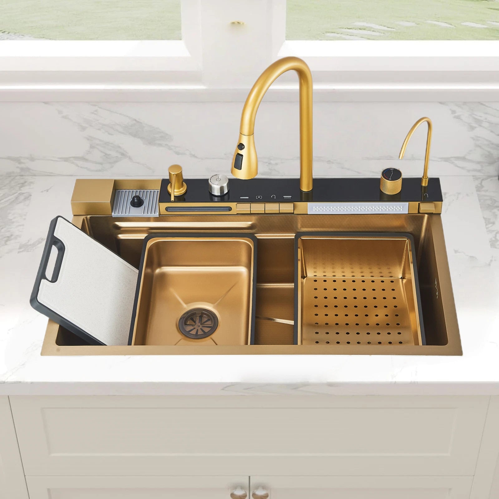 Gold kitchen sink with faucet in a modern kitchen setting