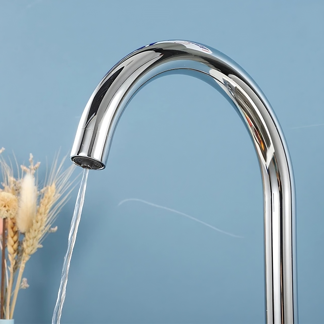 Kitchen faucet pouring filtered water with internal filter spout