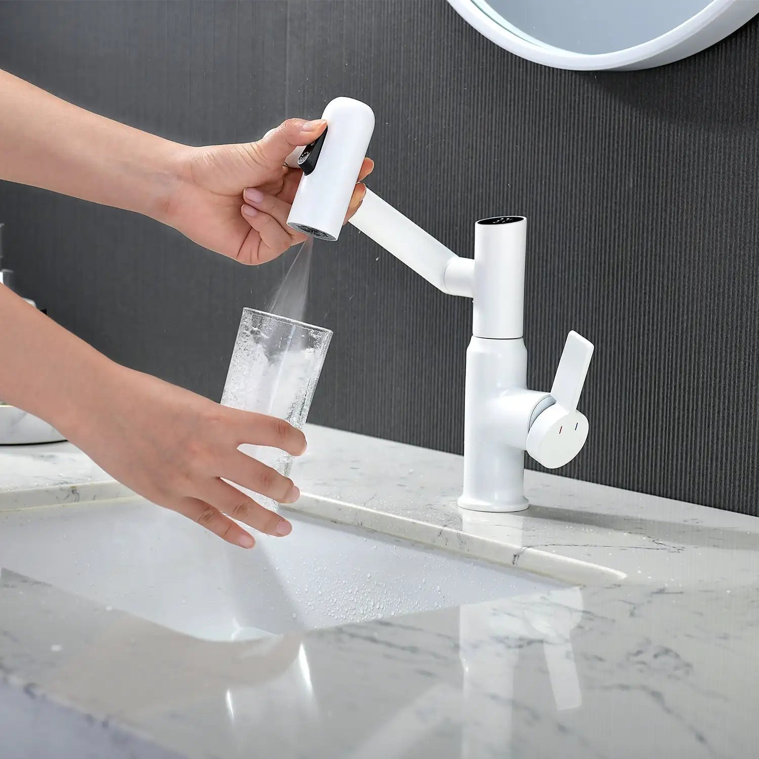 Using white Leiden faucet to fill a cup of water in a bathroom