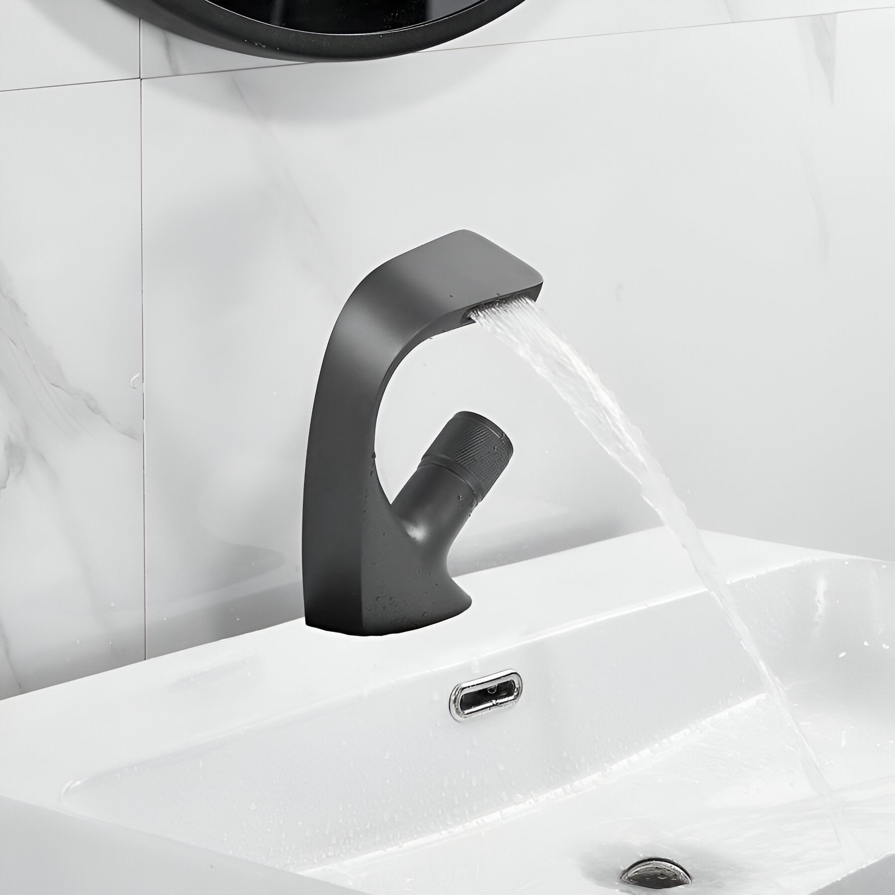 Gray bathroom faucet pours water