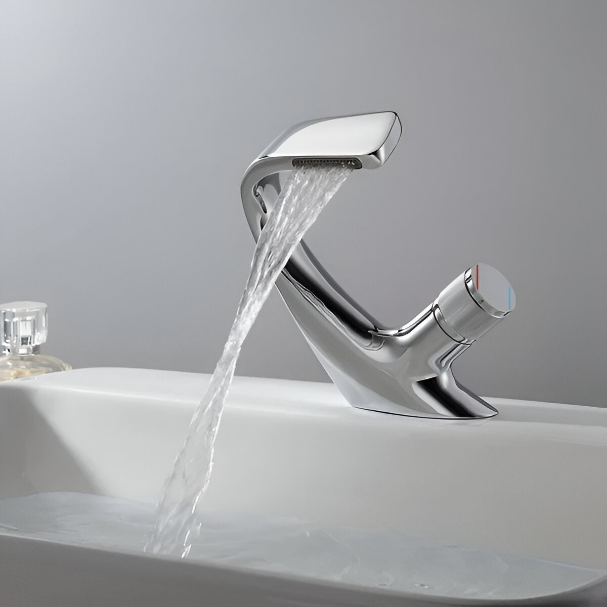 Chrome luxury bathroom faucet pours water